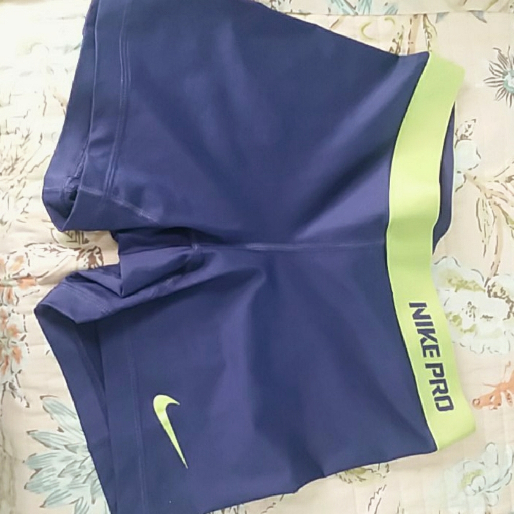 Nike pro purple and light green shorts